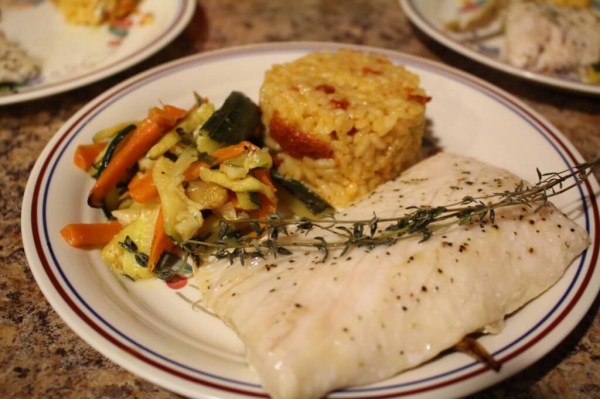 Mahi Mahi en Papillote with Sun-Dried Tomato Risotto