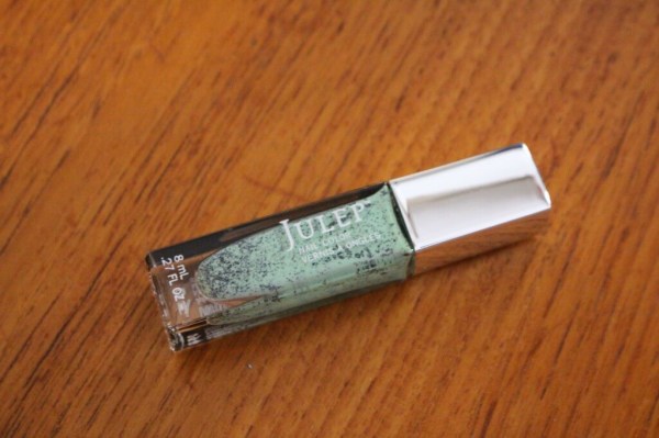 julep Felicia - Black speckled mint crème.