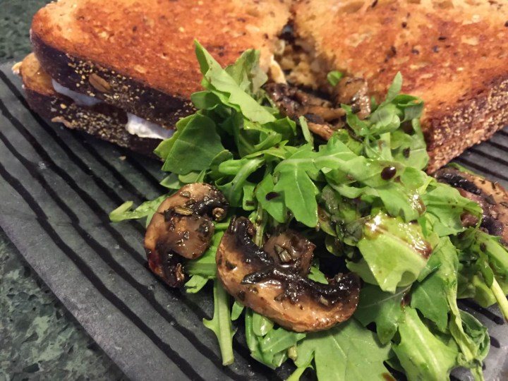 Fig & Brie Grilled Cheese with Crispy Mushroom and Arugula Salad closeup