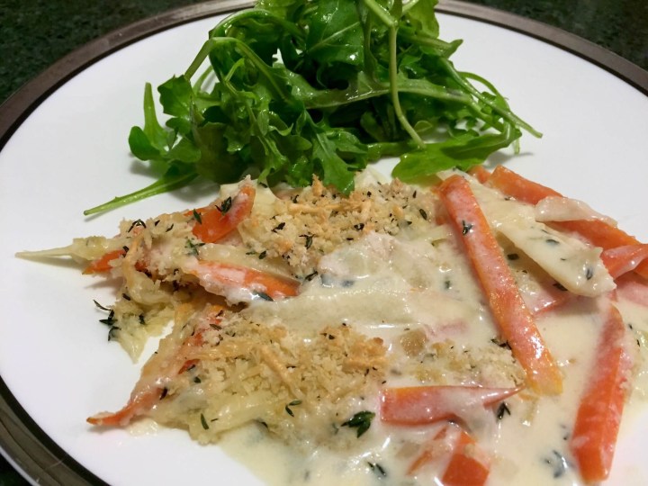 Parsnip and Carrot Gratin with Gruyere Mornay and Greens dish