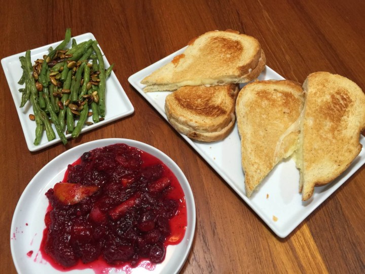 plated thanksgiving Grilled Cheese with Roasted Green Beans and Cranberry Compote.