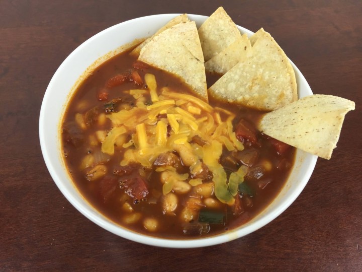 White Bean Posole with Poblano Pepper, Cheddar Cheese, and Tortilla Chips