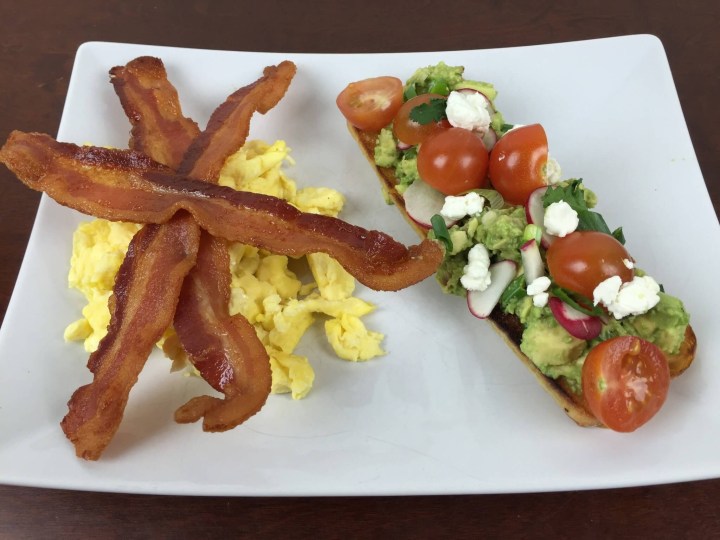 Avocado Tartine with Eggs and Bacon With Cherry Tomatoes and Goat Cheese