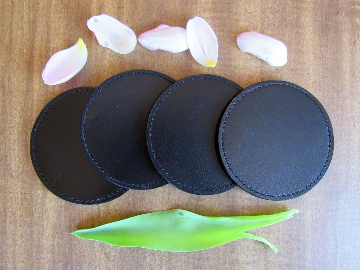 4 Black Coasters