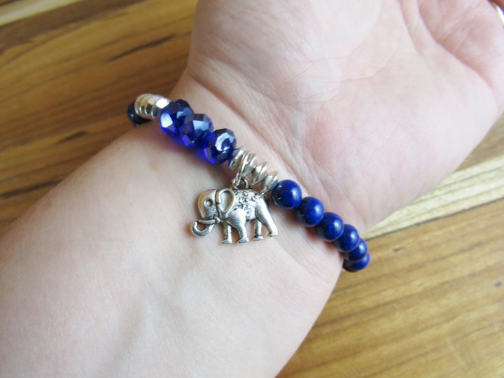 Elephant Charm Supports Water
