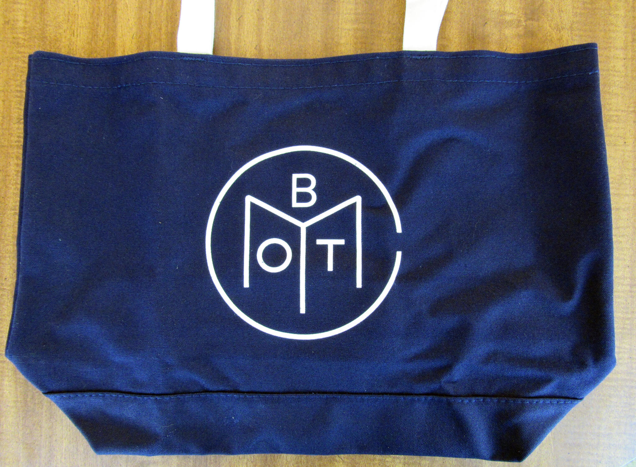 Book of discount the month tote