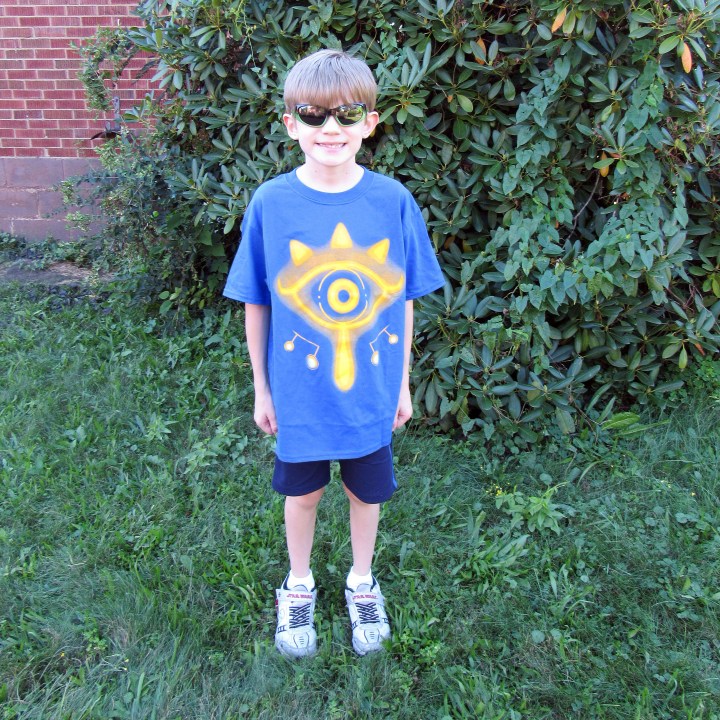 J is wearing a youth sizse medium.