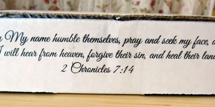 Scripture on side of box