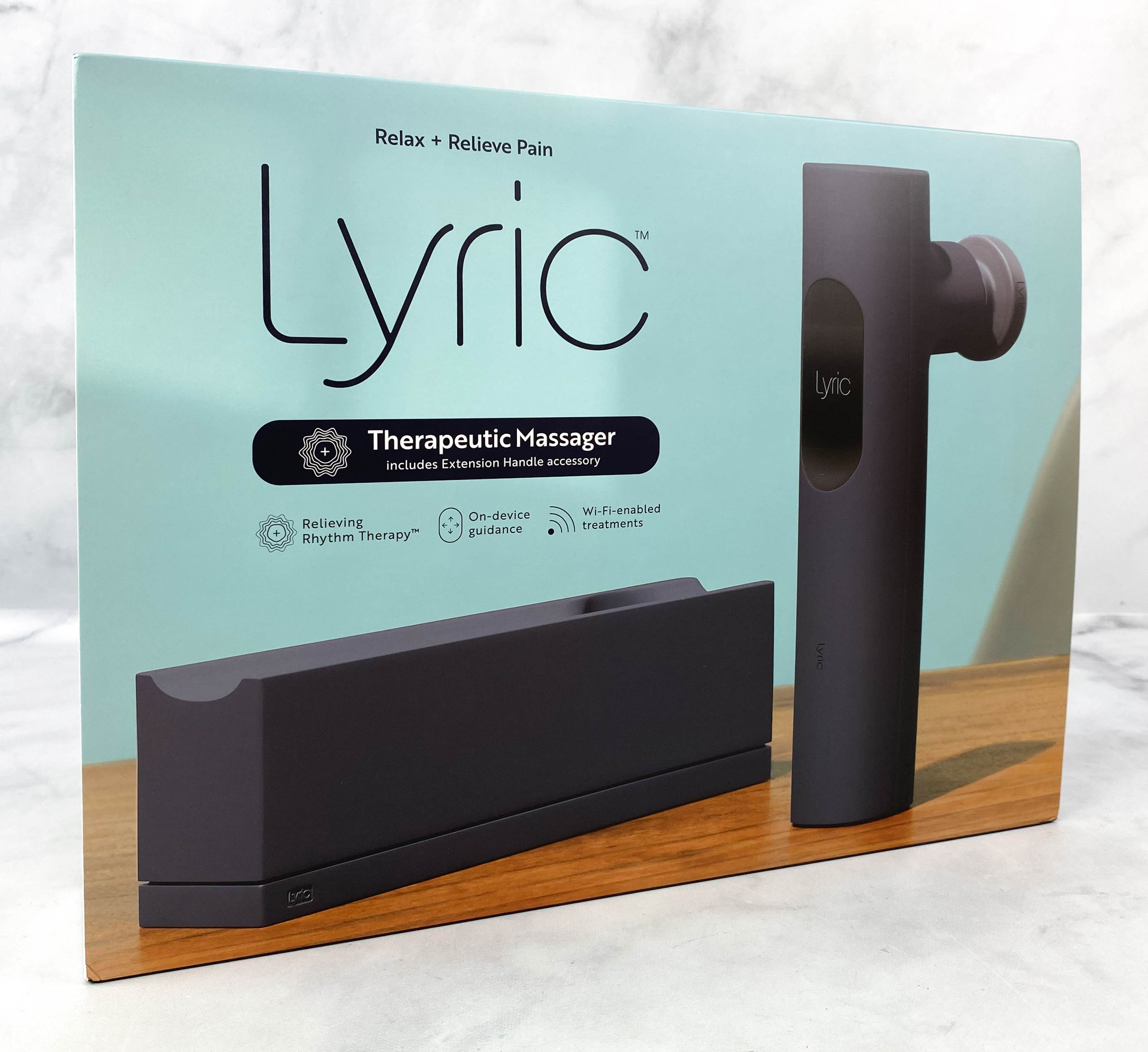 Smart Lyric Therapeutic Massager Looks Good Next to an iMac