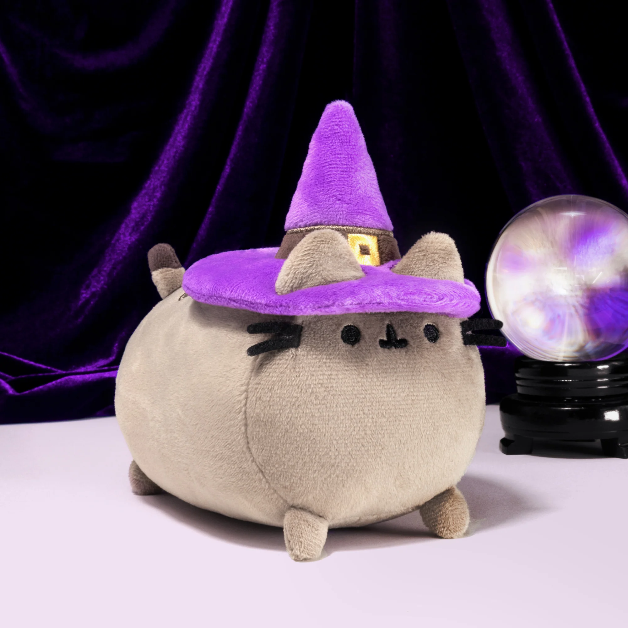 Pusheen selling witch cauldron